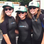 girls take a picture in oneill gear after lessons